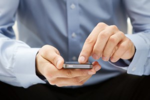 Close up of a man using smartphone